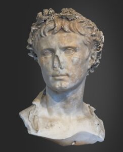 Stone bust of neck and head of the Roman Emperor Augustus. Bust is missing its nose