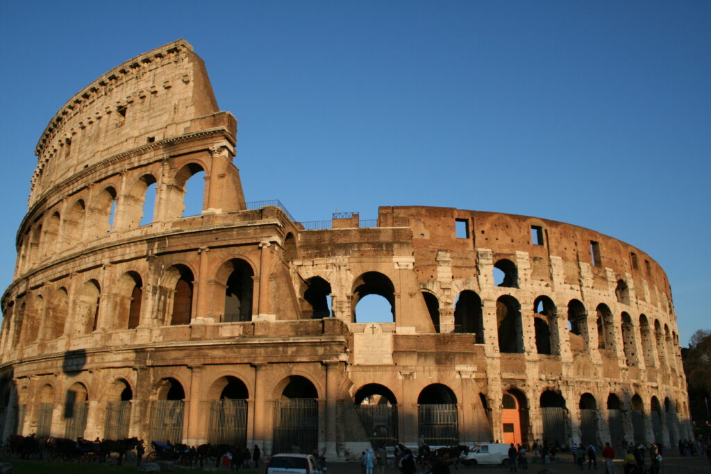 Colosseum in Rome. It is bathed in sunshine 